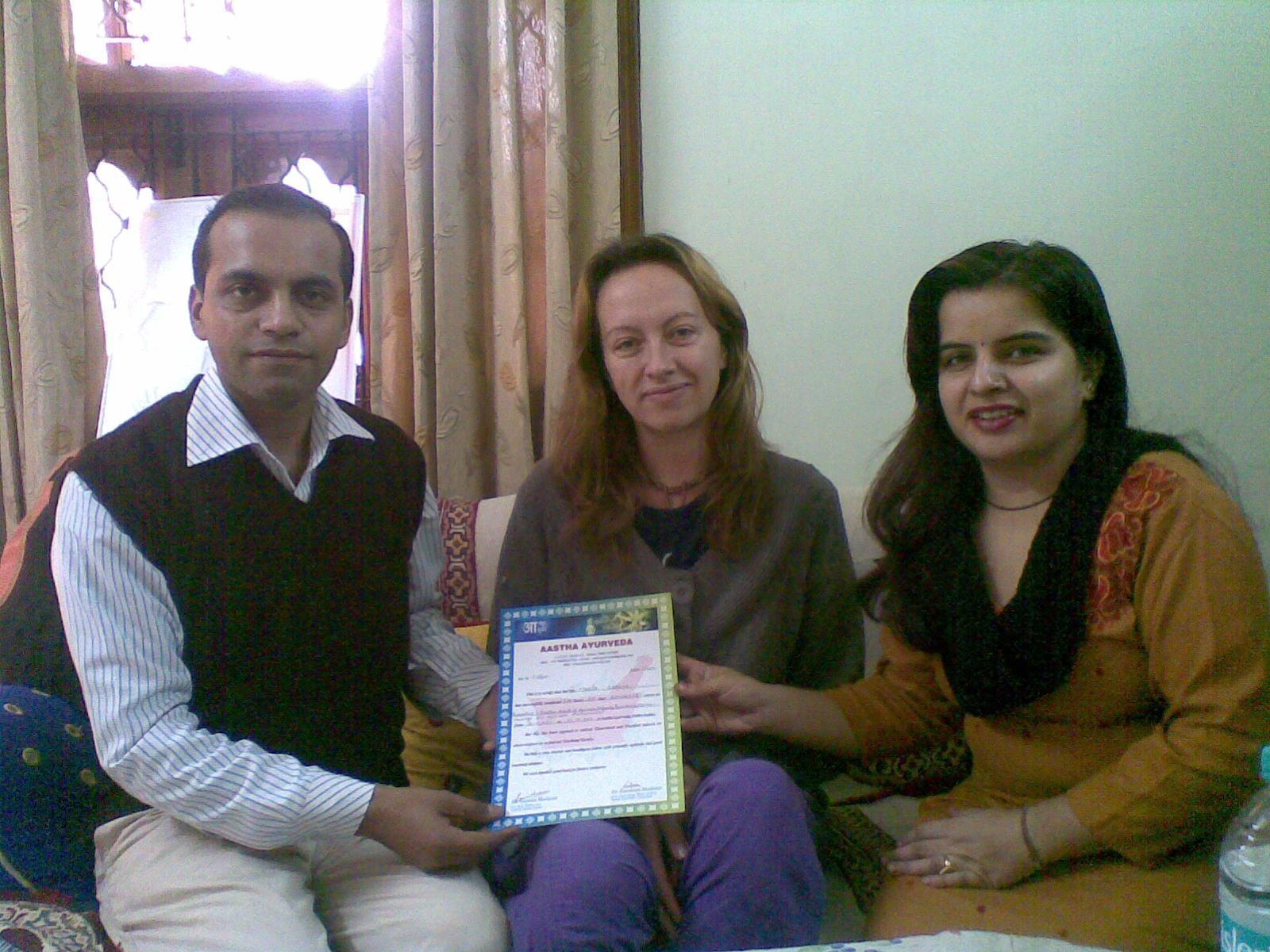 Spanish student Maria ,being issued a certificate for completion of Ayurveda Course